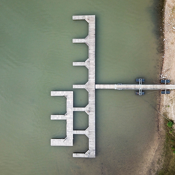 Sedimentation vs a floating jetty.